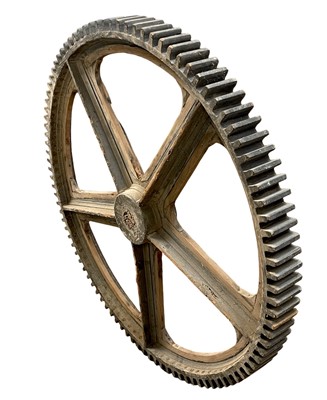Lot 51 - A large painted wood and pine cog pattern.