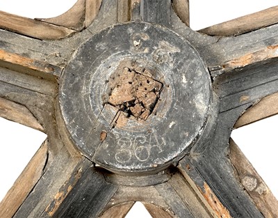 Lot 51 - A large painted wood and pine cog pattern.