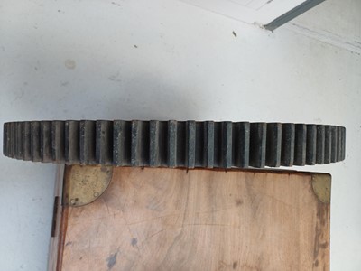 Lot 51 - A large painted wood and pine cog pattern.