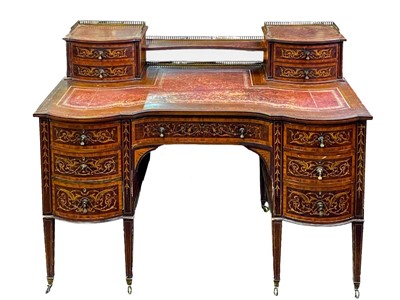 Lot 997 - A James Shoolbred mahogany, satinwood banded, and inlaid writing table.