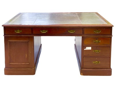 Lot 981 - A late Victorian Maple & Co mahogany partner's desk.