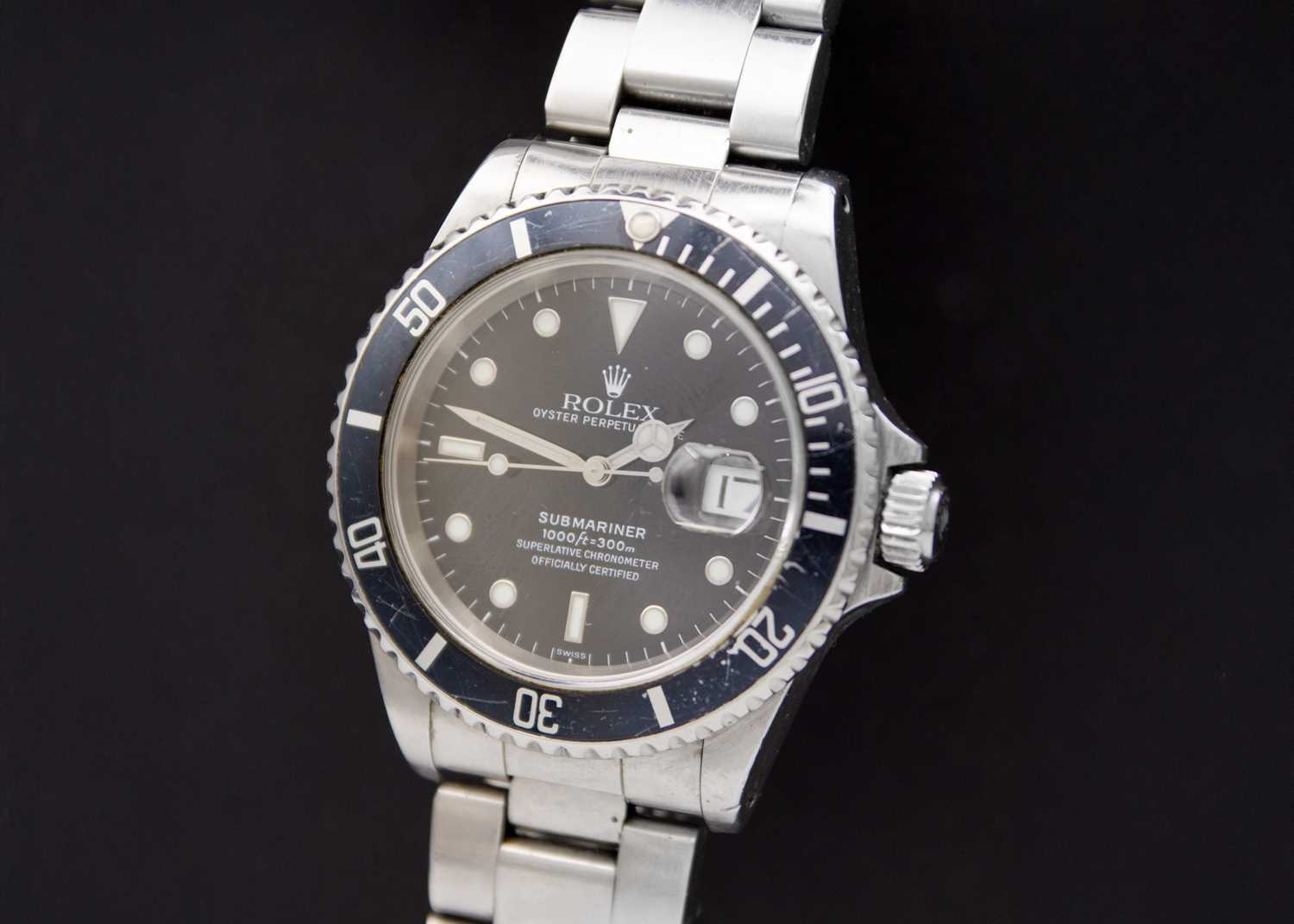 Lot 67 - ROLEX - A Submariner Oyster Perpetual Date stainless steel gentleman's wristwatch ref. 16610.