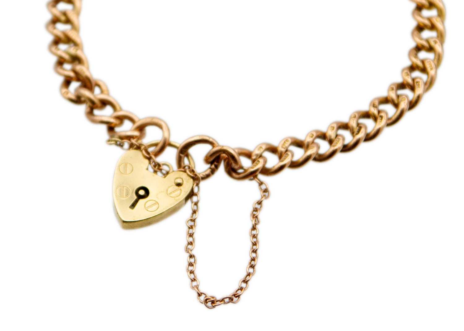 Lot 49 - A 9ct curb link bracelet with padlock clasp.