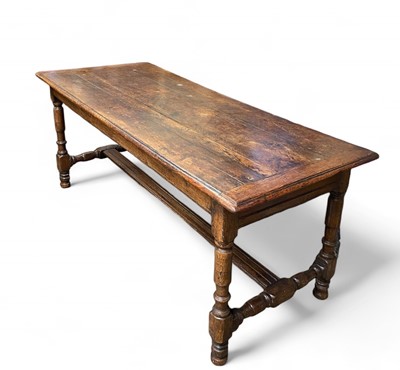 Lot 263 - A 17th century oak dining table.