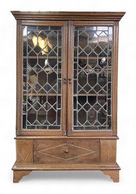 Lot 865 - An oak bookcase