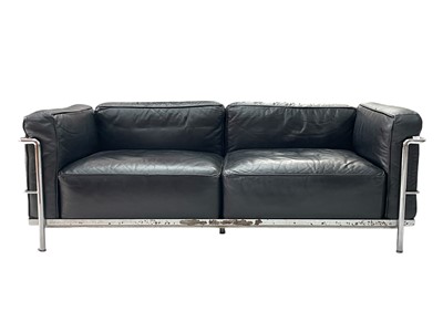 Lot 421 - A Le Corbusier design leather and chrome two-seater sofa.