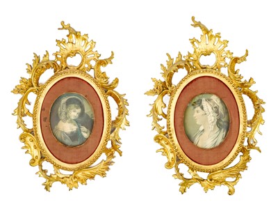 Lot 94 - A pair of small Florentine carved gilt wood rococo style frames.