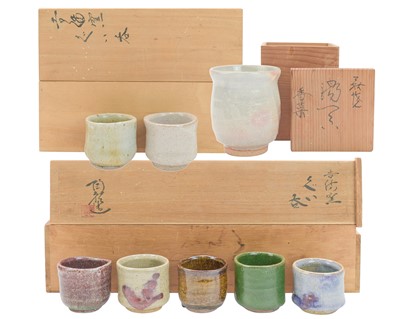 Lot 585 - A group of five Japanese stoneware yunomi.