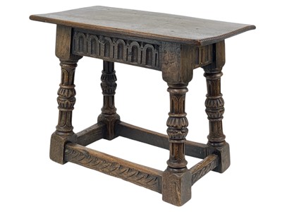 Lot 862 - An oak joint stool.