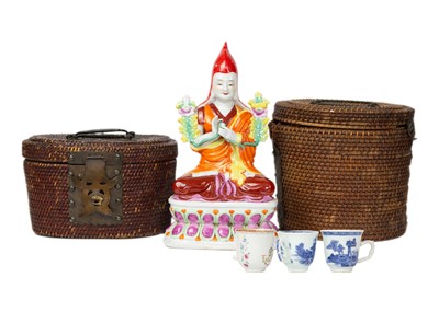 Lot 63 - A Chinese painted porcelain meditating lama, 20th century