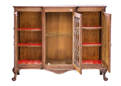 Lot 693 - Frank Rosier, an oak and linden wood display cabinet.