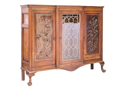 Lot 693 - Frank Rosier, an oak and linden wood display cabinet.