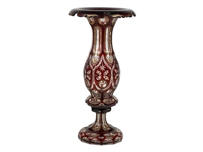 Lot 708 - A Bohemian cranberry flash gilt vase.