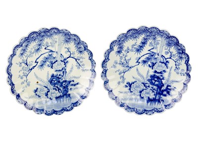 Lot 47 - A pair of Japanese blue and white porcelain chargers, Meiji period.