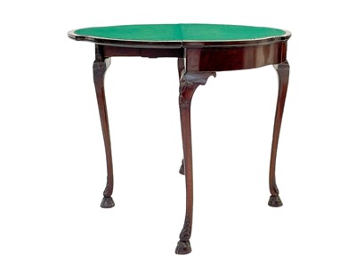 Lot 887 - A Georgian style mahogany fold top card table.