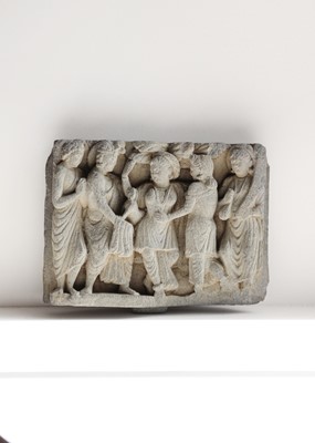 Lot 65 - A Gandharan carved schist panel, circa 3rd century.