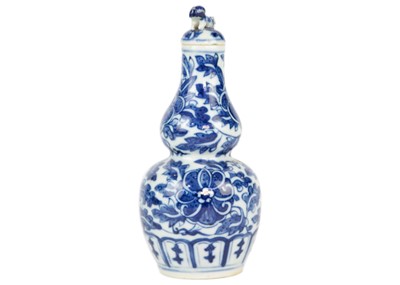 Lot 49 - A Chinese blue and white gourd vase, 19th century.