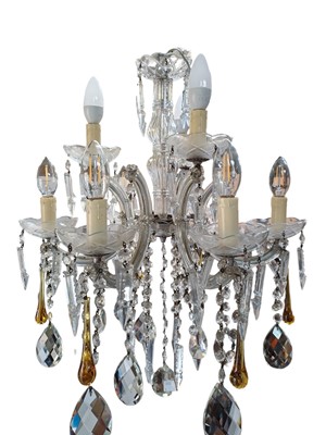 Lot 289 - A six branch cut glass chandelier.