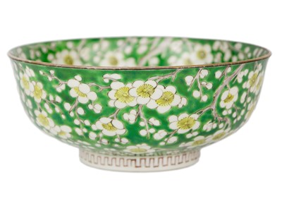 Lot 57 - A Japanese porcelain prunus pattern bowl, Meiji period.