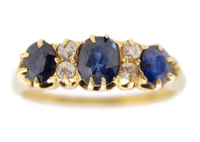 Lot 3 - An Edwardian 18ct hallmarked gold diamond and sapphire set ring.