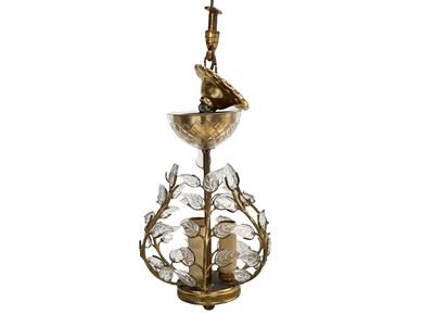 Lot 575 - A gilt brass and glass three light ceiling light.