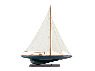 Lot 61 - A model of a yacht.