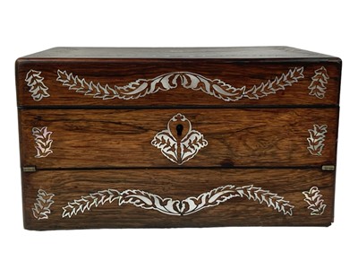 Lot 74 - A Victorian mother-of-pearl inlaid rosewood combined work/writing box.