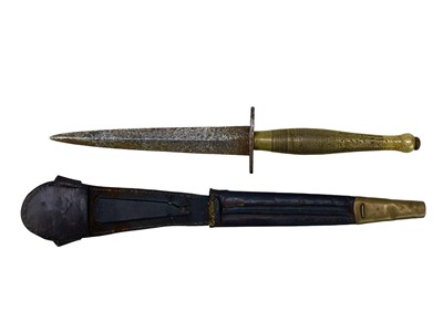 Lot 220 - An FS commando knife and scabbard, second pattern.