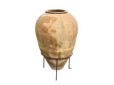 Lot 815 - A terracotta storage jar.