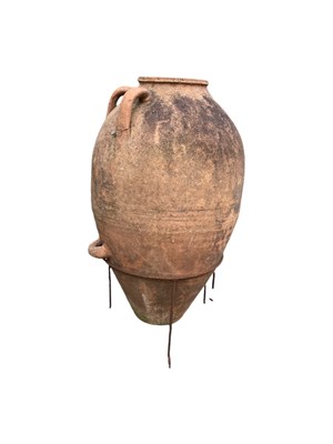 Lot 821 - A terracotta storage jar.