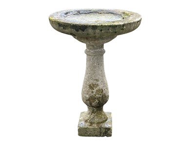 Lot 834 - A reconstituted stone bird bath.