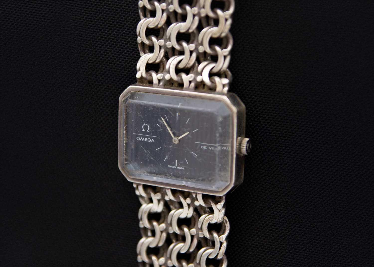 Lot 76 - OMEGA - A De Ville Jeux D'argent silver gentleman's manual wind bracelet wristwatch.