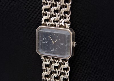 Lot 76 - OMEGA - A De Ville Jeux D'argent silver gentleman's manual wind bracelet wristwatch.