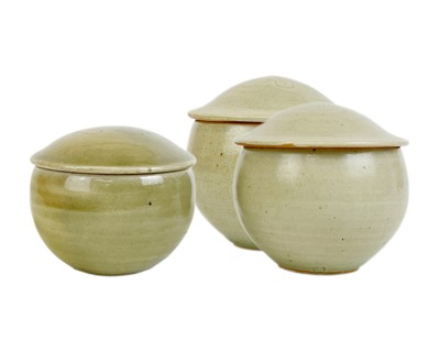 Lot 459 - Three Leach Standard Ware pots with oak leaf motif to lids.