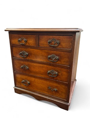 Lot 909 - A late Victorian miniature mahogany chest.