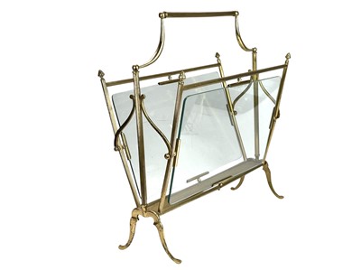 Lot 956 - A mid century French brass and glass magazine rack probably Maison Bagues.