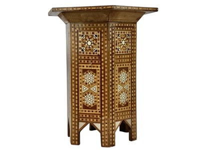 Lot 882 - A 20th century Syrian inlaid hexagonal side table.