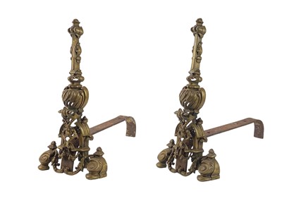 Lot 1 - A pair of French brass chenets.