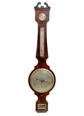 Lot 516 - A George III mahogany wheel barometer.