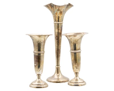 Lot 56 - A pair of George V silver spill vases and one other.