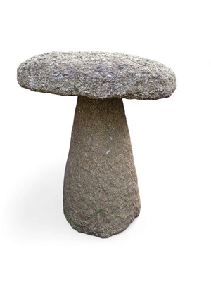 Lot 811 - A granite staddle stone.