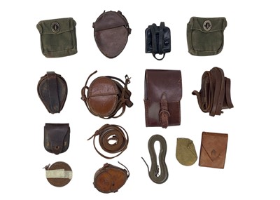 Lot 510 - A collection of various compass cases and straps.