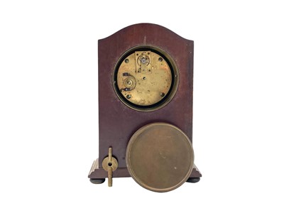 Lot 519 - A French rouge marble and black slate mantel clock.