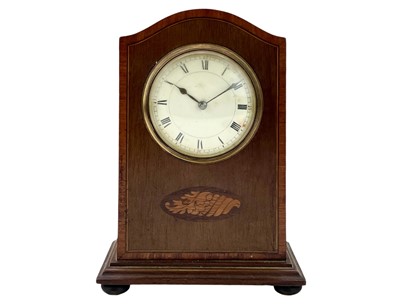 Lot 519 - A French rouge marble and black slate mantel clock.