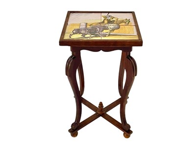 Lot 890 - A tile top occasional table.