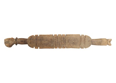 Lot 72 - Two Tuareg carved wood tent pegs.