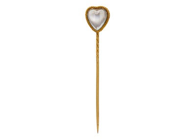 Lot 112 - A Victorian heart-shaped moonstone stick pin set in gold.