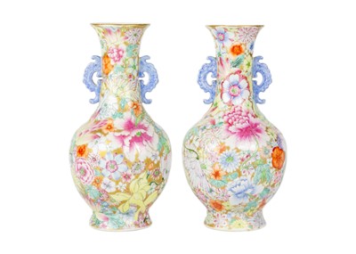 Lot 135 - A pair of Chinese millefleur twin handled vases, circa 1900.