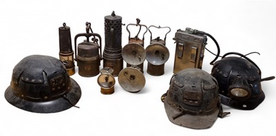 Lot 1258 - A collection of seven assorted vintage miners lamps.