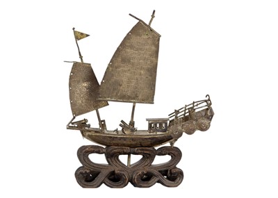 Lot 208 - A Chinese silver model of a junk, circa 1900.